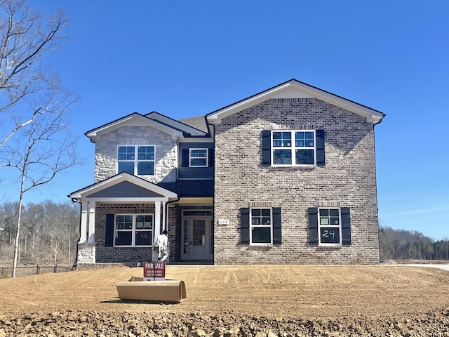 view of front of property with brick siding