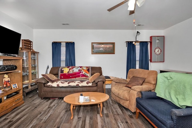 living room featuring hardwood / wood-style flooring and ceiling fan