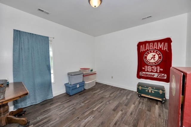 miscellaneous room with dark hardwood / wood-style flooring