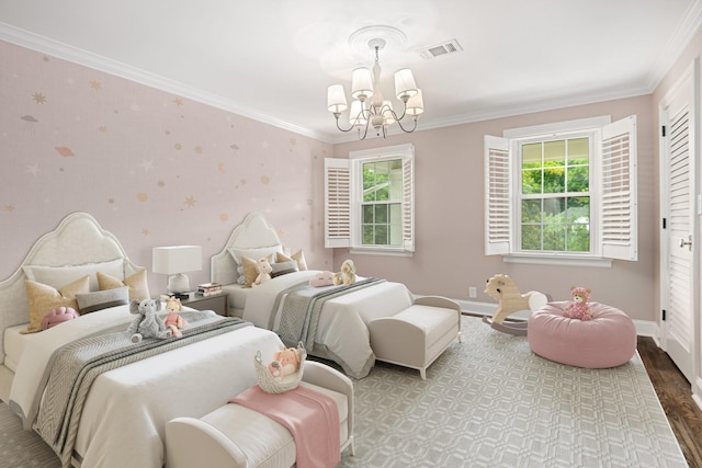 bedroom with multiple windows, crown molding, a chandelier, and hardwood / wood-style flooring