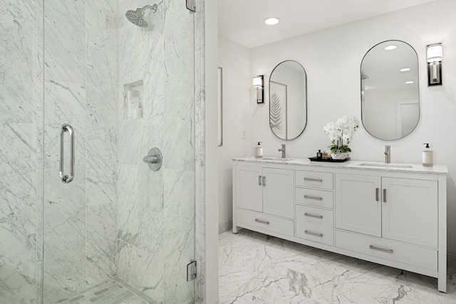 bathroom with vanity and an enclosed shower