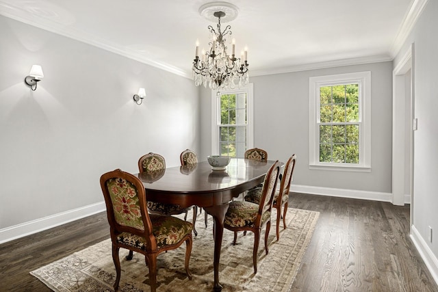 dining area featuring crown molding, dark hardwood / wood-style flooring, and a notable chandelier