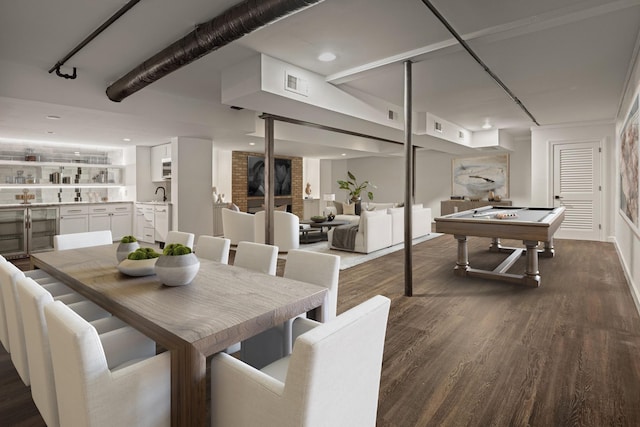 dining space featuring dark hardwood / wood-style flooring, sink, and billiards