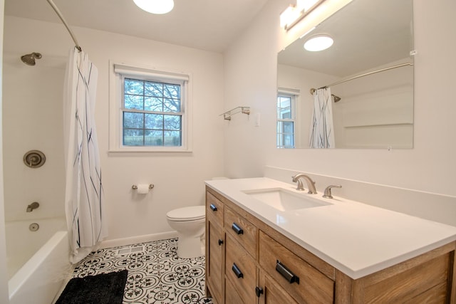 full bathroom featuring tile patterned flooring, shower / tub combo, vanity, and toilet