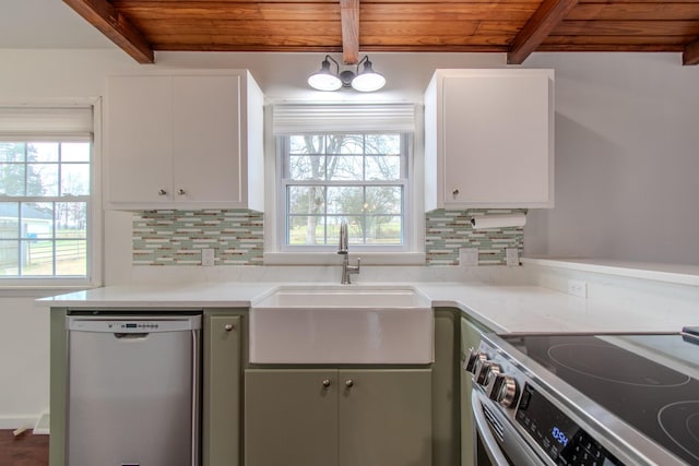 kitchen featuring beam ceiling, sink, wooden ceiling, and stainless steel appliances