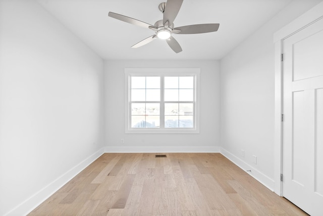 unfurnished room with light hardwood / wood-style floors and ceiling fan