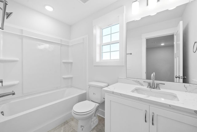 full bathroom featuring vanity, toilet, tile patterned floors, and shower / bathing tub combination