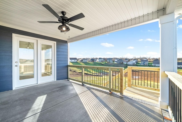 balcony featuring ceiling fan