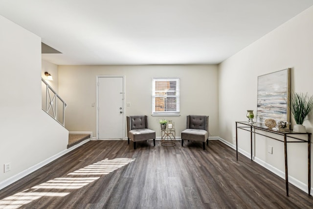 sitting room with dark hardwood / wood-style floors