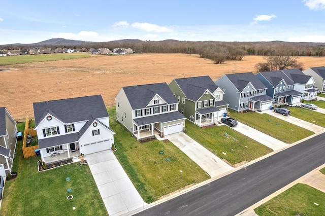 bird's eye view with a mountain view