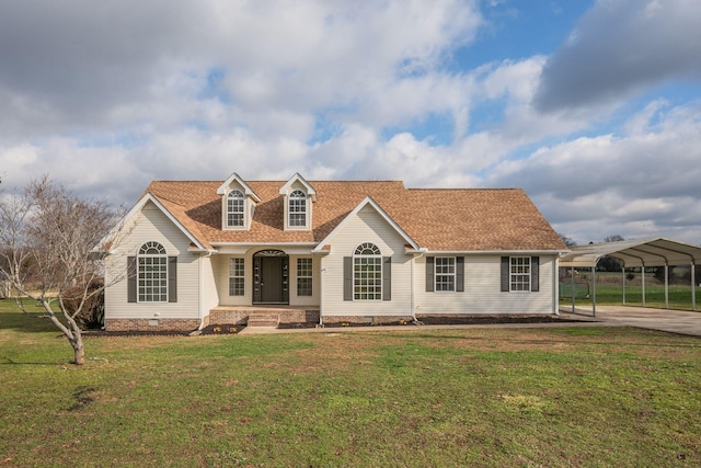 cape cod house with a front yard and a carport