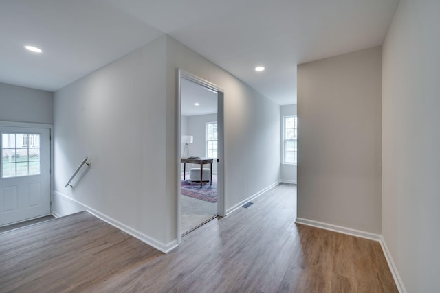 hallway featuring light wood-type flooring