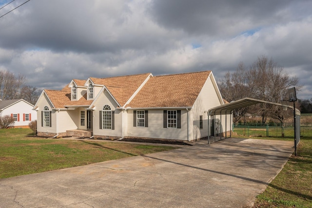 view of front facade featuring a front lawn and a carport