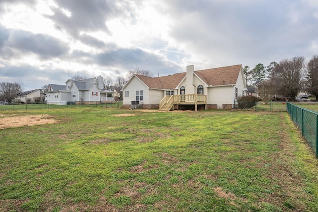 view of yard with a wooden deck