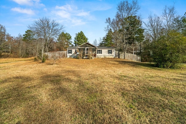 view of yard featuring a sunroom