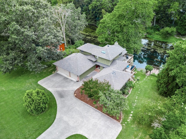 birds eye view of property featuring a water view