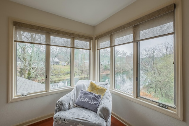 sunroom with a water view