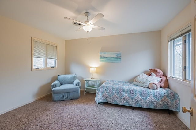 carpeted bedroom with ceiling fan