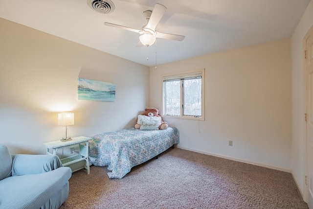 bedroom featuring ceiling fan and carpet