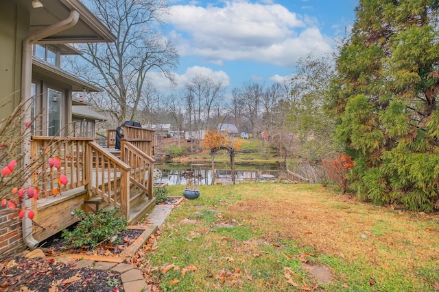 view of yard with a water view