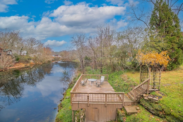 dock area with a deck with water view