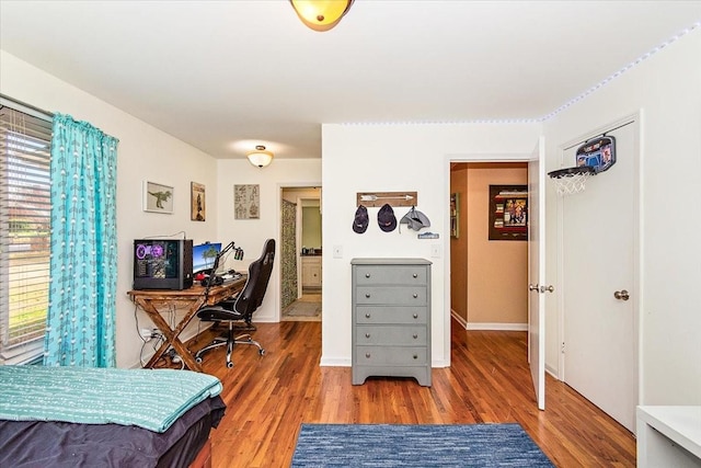 office space with hardwood / wood-style floors