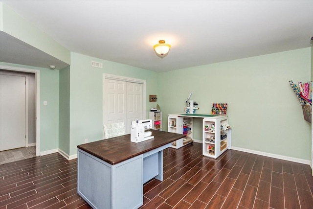 interior space featuring dark hardwood / wood-style flooring and wooden counters