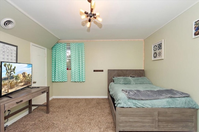 carpeted bedroom featuring ornamental molding and an inviting chandelier