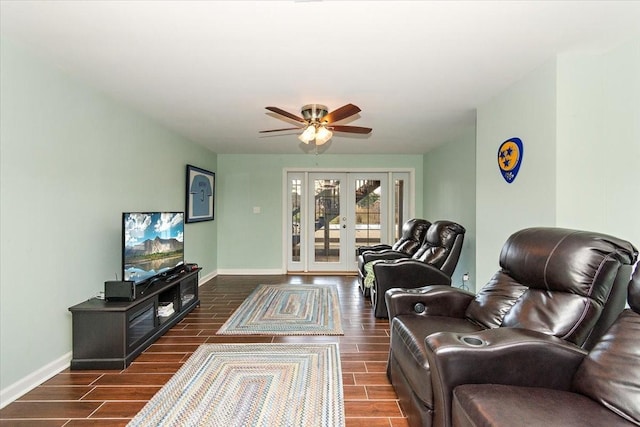 living room featuring french doors, dark hardwood / wood-style floors, and ceiling fan