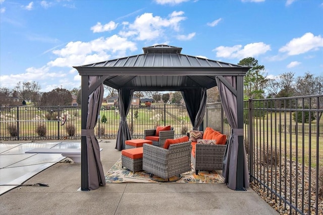 view of patio with a gazebo and an outdoor living space