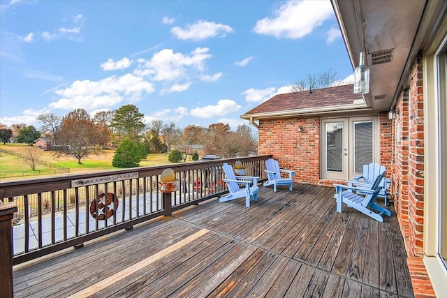 wooden deck with french doors