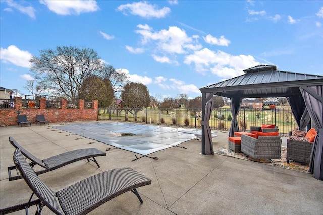 view of patio / terrace featuring a gazebo and an outdoor living space