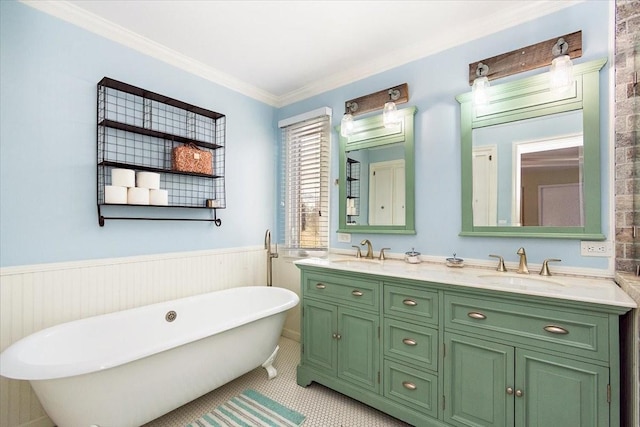 bathroom featuring a bathing tub, vanity, and crown molding