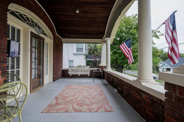 view of patio featuring a porch