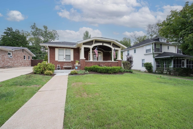 view of front of house featuring a front yard and a porch