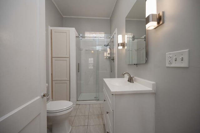 bathroom with crown molding, vanity, toilet, and an enclosed shower