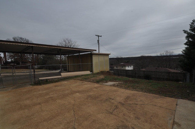 view of patio featuring an outdoor structure