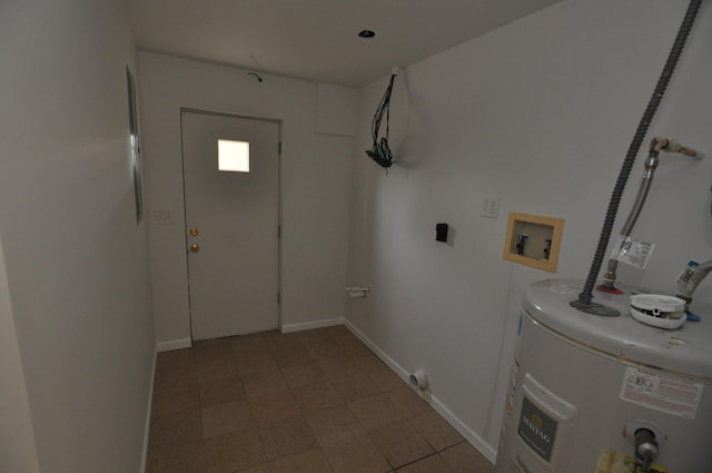 laundry area with washer hookup, water heater, and hookup for an electric dryer