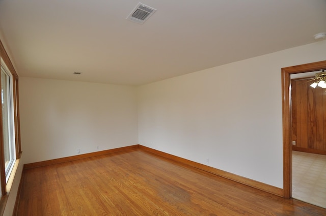 unfurnished room with plenty of natural light and light wood-type flooring