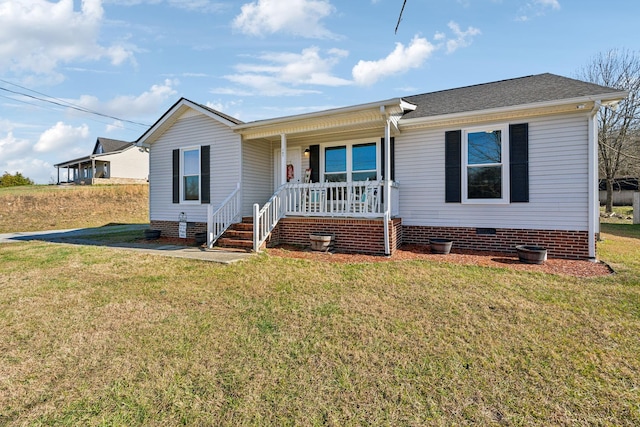 view of front of house with a front lawn and a porch