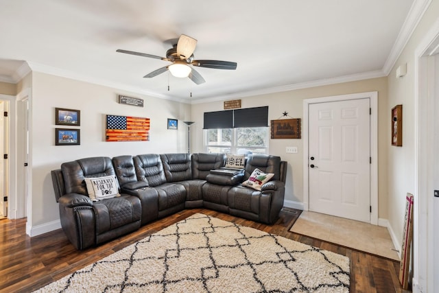 living room with crown molding and dark hardwood / wood-style flooring