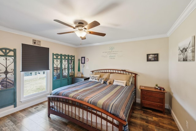 bedroom featuring ceiling fan, dark hardwood / wood-style flooring, and crown molding