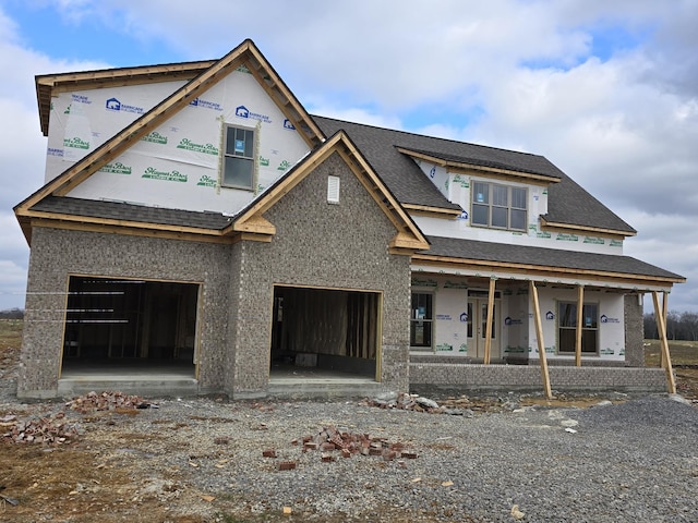 property in mid-construction with a garage