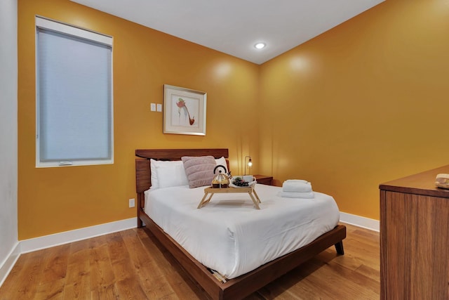 bedroom featuring light hardwood / wood-style flooring