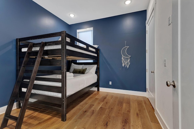 bedroom featuring hardwood / wood-style flooring