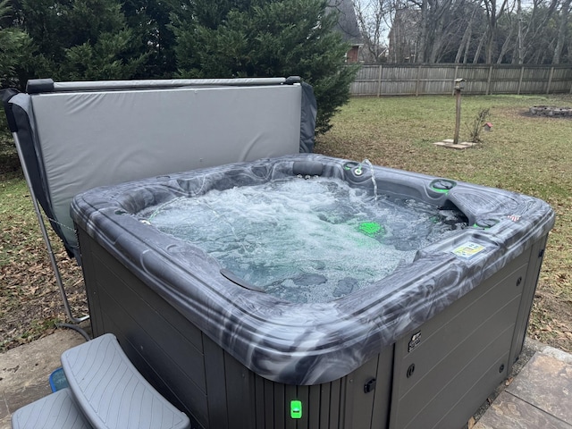 exterior details featuring a hot tub