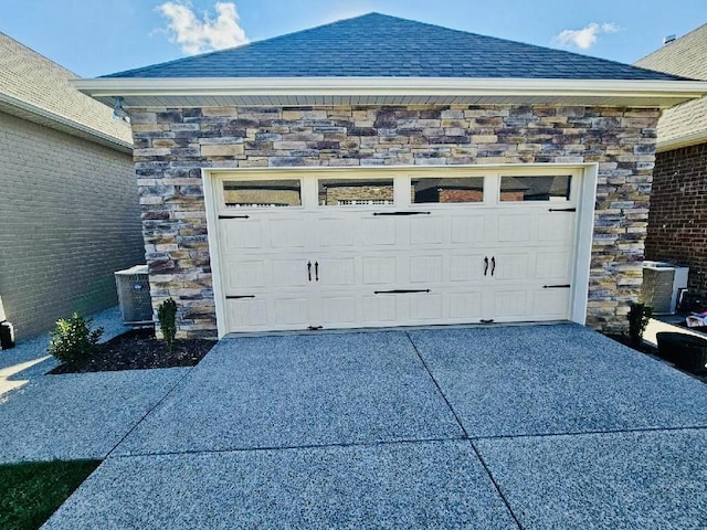 garage featuring central air condition unit