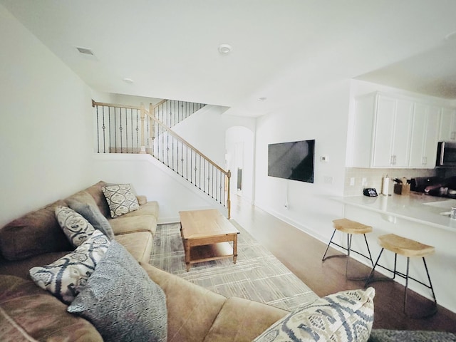 1528 Cedarbrooke Ln, Lebanon, TN 37090 - living area featuring stairway and arched walkways