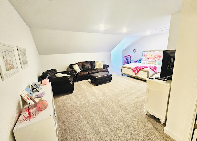 carpeted bedroom with lofted ceiling