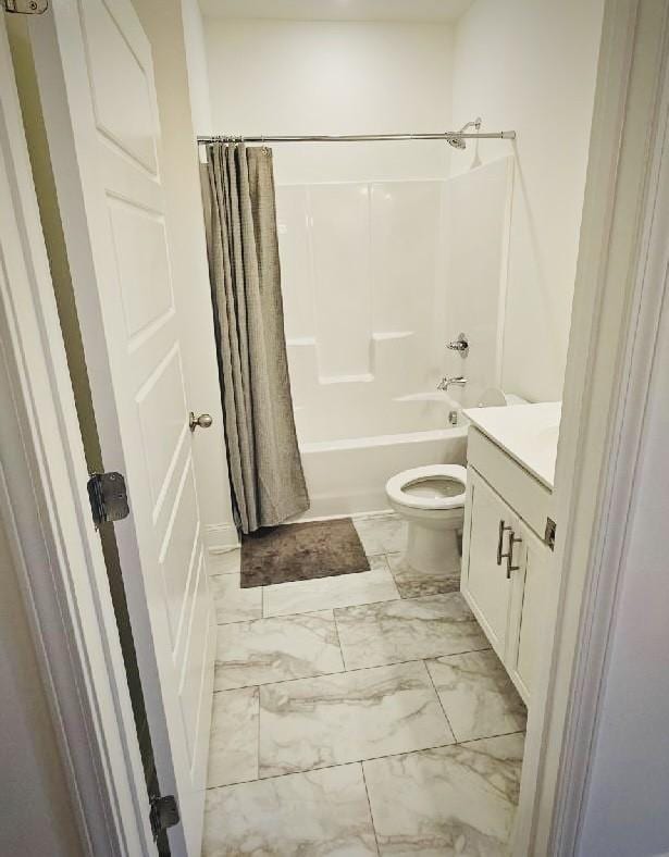 full bathroom featuring vanity, toilet, and shower / tub combo